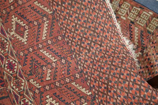 A Bokhara red ground rug 125 x 150cm